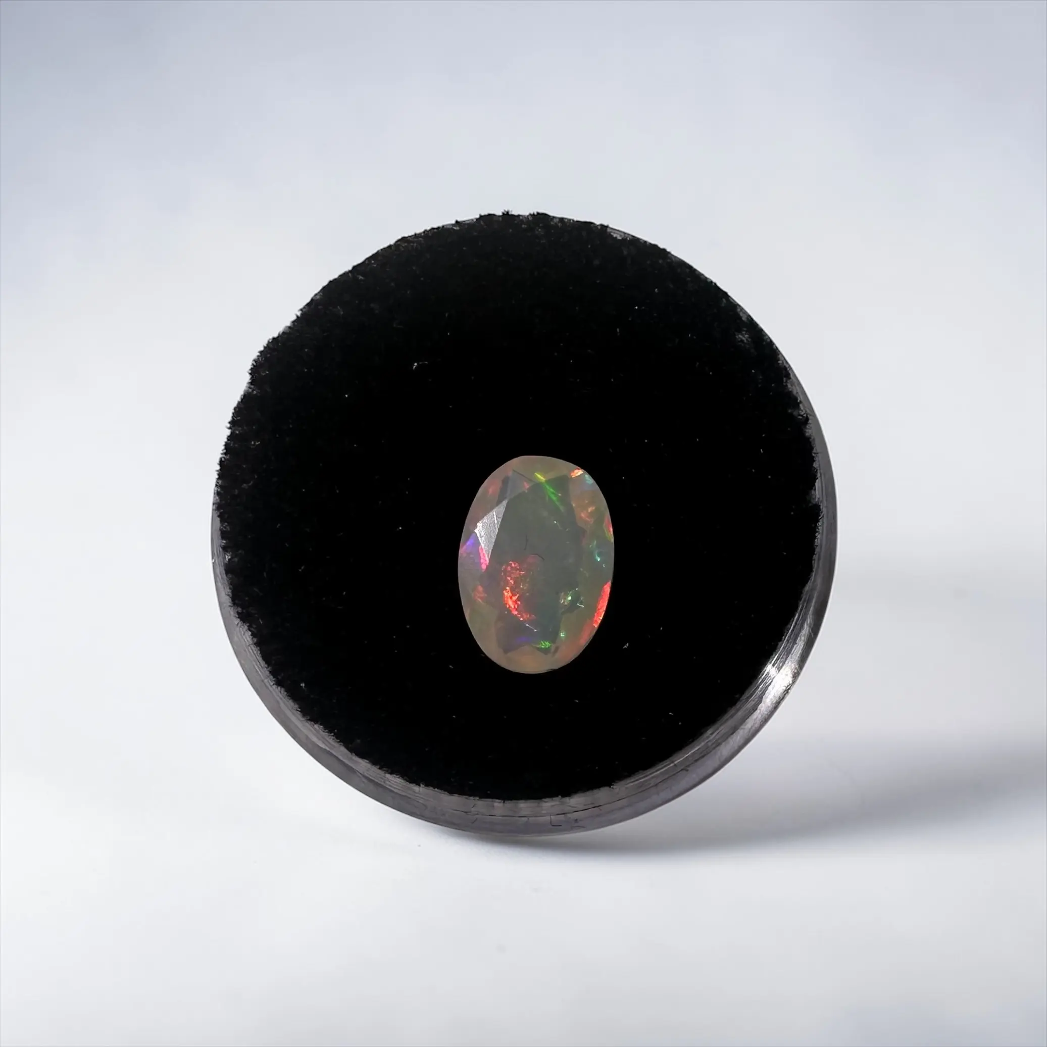 1.10 ct Natural Ethiopian Welo Opal Gemstone | Faceted Oval, Red Green Multi-Fire