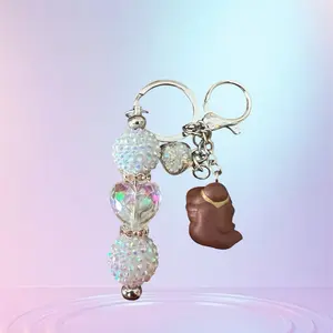 KEYCHAIN WITH SMALL CHARACTER LIVE CLAIM