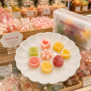 Snack candies, containing syrup - various fruit-flavored candy syrups, with cute appearance and edible wax bottles. Suitable for chewing, it is a sweet gift option. Jam-flavored type, each box contains 3.5 ounces.