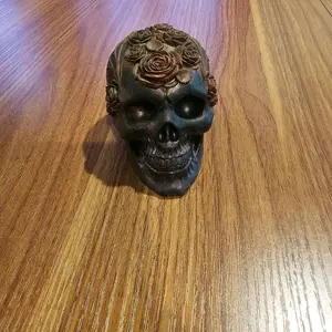 Resin Skull Head 4 Piece Set with Floral Design on Top Handmade in 4 Colors Black Blue and White Decorative Skulls