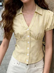 A women's fashionable yellow and white striped bubble sleeve short shirt adds sweetness, with a short silhouette that is proportionate and suitable for commuting to work, shopping, outdoor activities, indoor and outdoor dressing