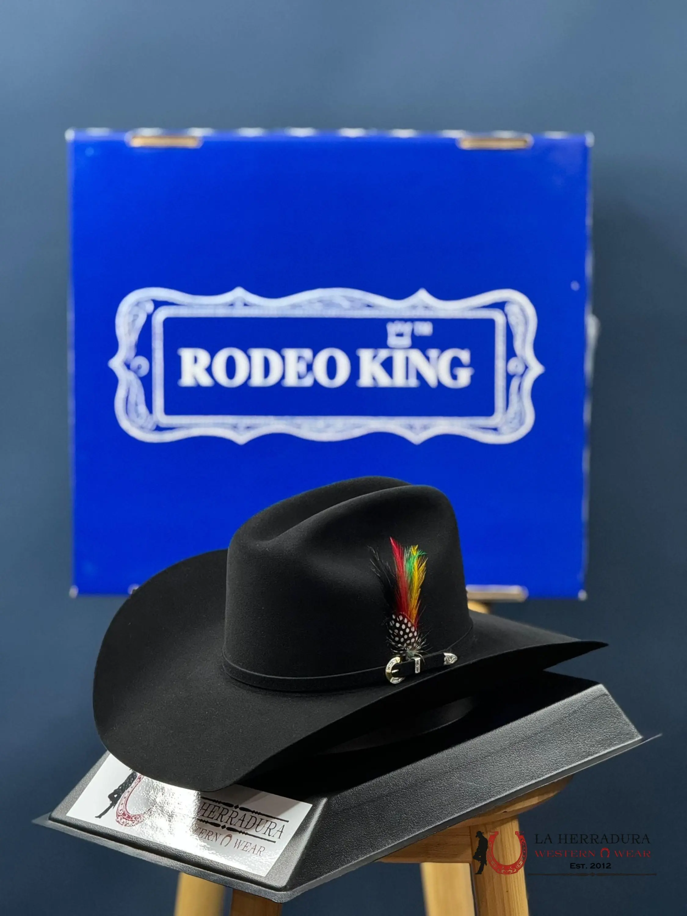 Rodeo King 1000X Black Top Hand with Colorful Feathers and Classic Design