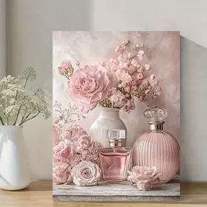 This canvas artwork features a vintage floral perfume bottle adorned with soft pink roses and pastel flowers. This framed wall art piece is perfect for decorating a bedroom, living room, or home office.