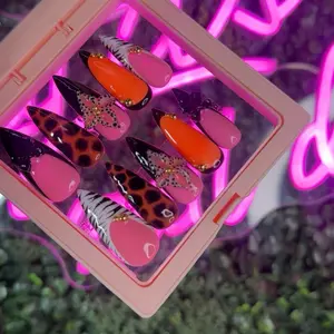 Cheetah Print Design with Flower Design Nails - Unique Nail Art Collection Featuring Leopard Patterns and Floral Accents