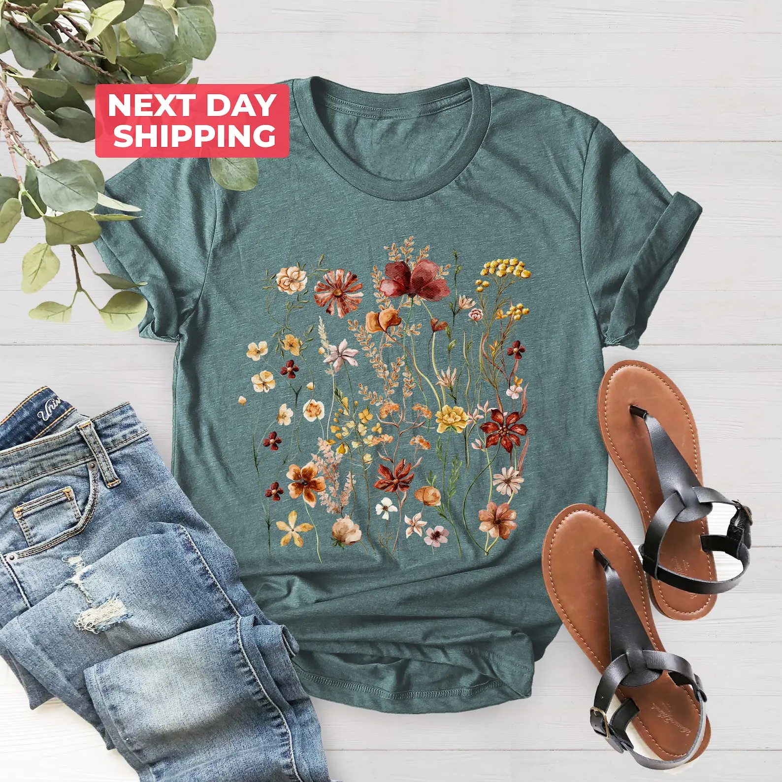 "Embrace the Charm of Vintage Cottagecore with our Goblincore Shirt! Explore the Boho Wildflowers, Nature's Beauty, and Botanical Delights with our Garden Lover Autumn Green Witch Shirt." Cotton Fit Womenswear Basic