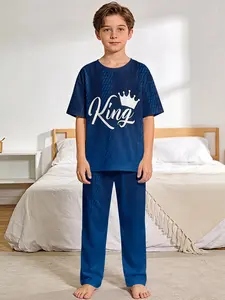 Royal blue gradient crown king style pajama set with digital printed short-sleeve top and extended sleep pants, made of flame-retardant fabric. Fashionable, trendy, casual, comfortable and soft pajama set, suitable for sleeping and home leisure. 100% poly
