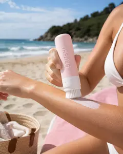 BRUSHI Refillable Sunscreen Blending Bottle - 2-in-1 Squeezeable Sunscreen Applicator and Brush, Mess-Free for All Skin Types