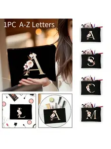A best-selling fashion item: a women's makeup bag and storage bag with a polyester fiber letter print zipper, perfect as a gift for couples and families. A women's storage bag with English letter print. Coin purse.