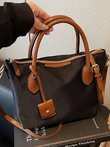 Minimalist classic color-block shoulder/crossbody bag with two top handles and adjustable shoulder straps; a casual commuter handbag with a retro British “dumpling” design; a nylon water-resistant everyday tote; Everyday Shoulder Bag; niche style suitable