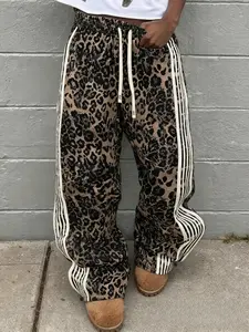 Unisex Leopard Print Casual Pants, Side Stripe Patchwork Design, Drawstring Cuffed Hem, Trendy Streetwear Hip Hop Style, Casual Streetwear Trousers