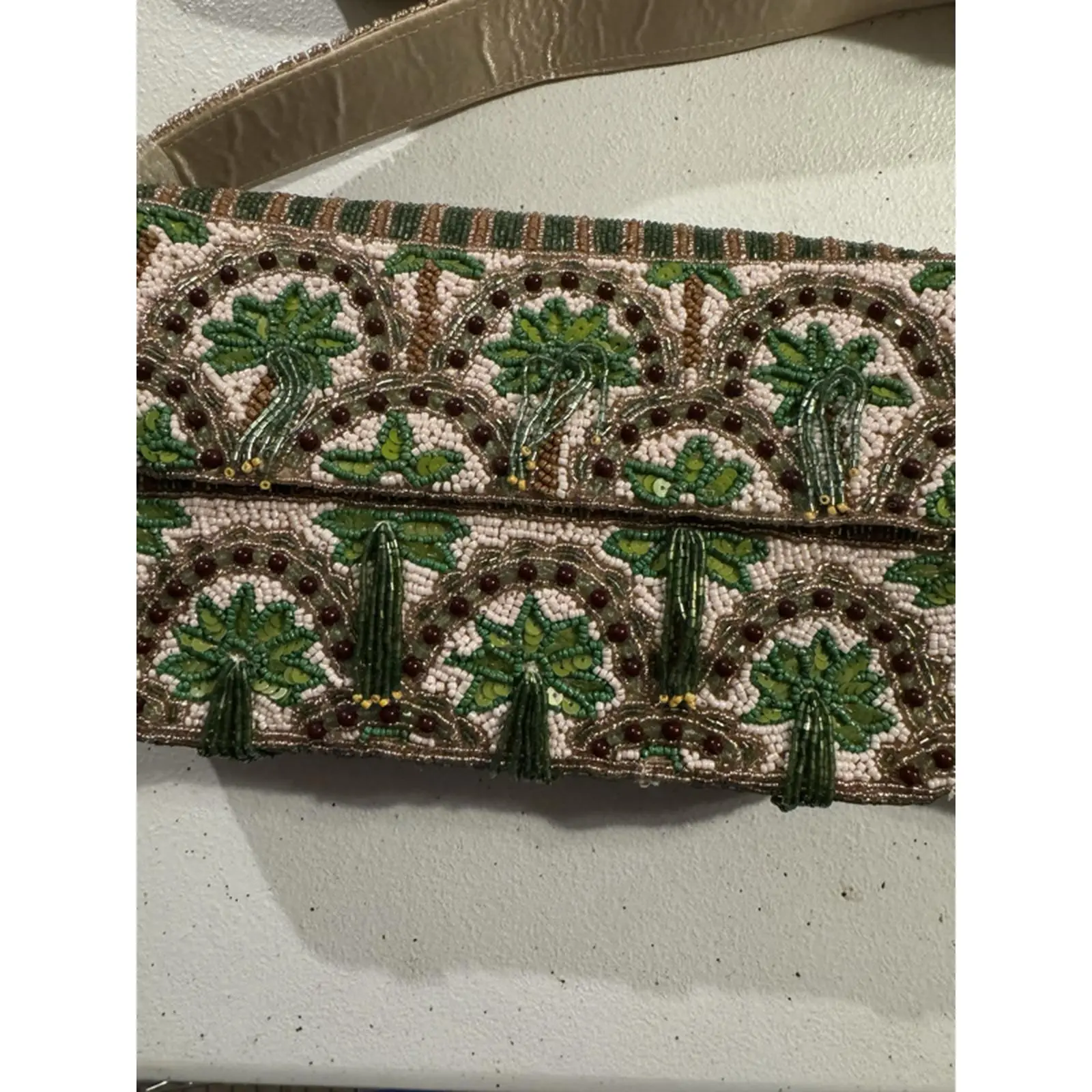 Elegant Beaded Clutch with Green and Brown Patterns and Tassels