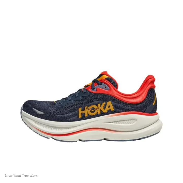 Low-Profile Running Shoes with Navy Blue Knit Upper and Vibrant Orange Accents