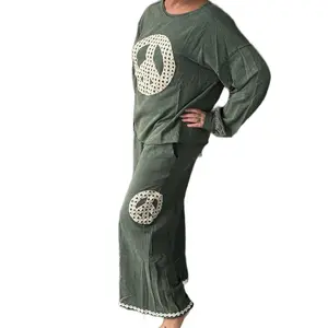 This Peace Terry Set in Hunter Green by UMGEE.  Mineral wash -boxy cut with lace appliqué  Womenswear Comfort loungewear  100%cotton wide leg with pockets