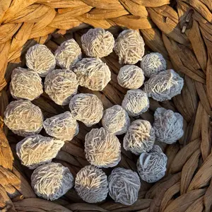 Desert Rose is a unique, rosette-shaped crystal cluster of gypsum or barite that forms in arid, sandy conditions, mimicking the petals of a rose.