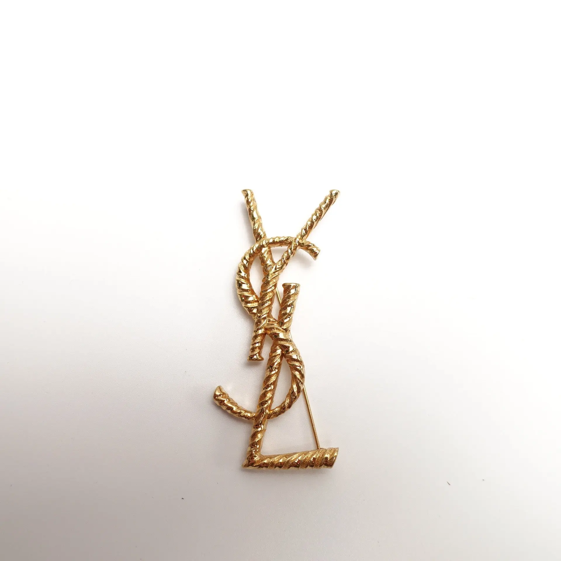 Pre-owned Yves Saint Laurent Gold Tone YSL Logo Brooch T10435569