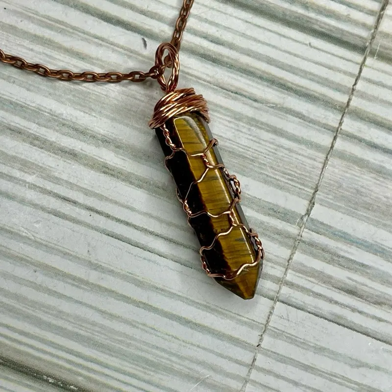 Tigers Eye Classic Twist Pendant for prosperity, protection, and taking action