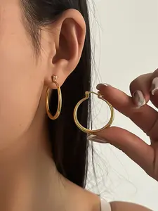 1 pair of gold/silver plated oversized hoop earrings with a minimalist, glossy punk style, perfect for holiday parties and streetwear looks.