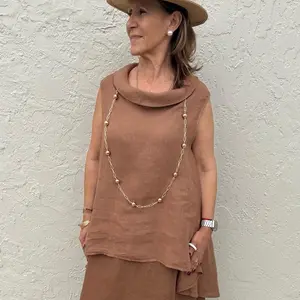 Fits from extra small to extra large one size 100 percent linen Anaí tunic sleeveless relaxed flowy top breathable lightweight natural fabric elegant minimal design versatile loose silhouette Ibiza style chic effortless outfit soft premium linen comfortab