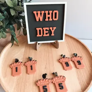 Favorite Player Earrings - Who Dey Collection with Number 1 and 5 Designs on Orange Background