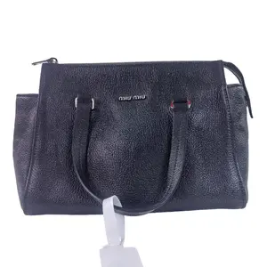 Pre-owned miu miu leather handbag black pebbled top handle satchel with silver logo plaque. qg604