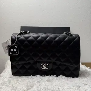 Pre-owned CHANEL Lambskin Small Leather Goods Jumbo Classic Double Flap Bag