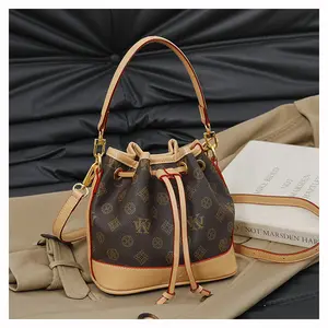 Fashion drawstring small bucket bag, retro print shoulder/crossbody bag, everyday multifunctional commuter shoulder bag, eye‑catching stylish mini crossbody bag, refined women’s avant‑garde handbag, a quality gift for a girlfriend
