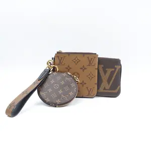 Pre-owned Louis Vuitton Coated Canvas Clutches & Wristlets Trio Reverse Monogram Wristlet T10387001