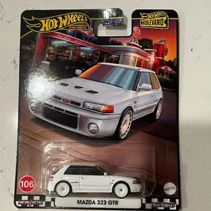 Brand New Mattel Hot Wheels Premium Boulevard #106 Mazda 323 GTR