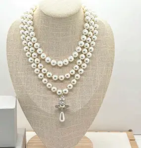 Y2K Style Queen Mother West Mini Three-layer Pearl Little Saturn Pearl LovePin 3D Planet Necklace & Bracelet Premium Titanium Alloy Ideal for Daily Wear & Parties Daily Wear Jewelry Y2KFashion Accessory Durable Alloy