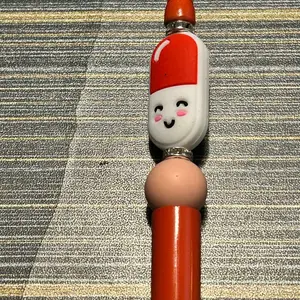 Red pill bead pen