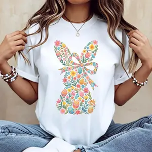 Casual Women’s White T-Shirt Featuring Easter Bunny With Pink Bow and Colorful Swirls Perfect for Spring Festivals and Holiday Wear Soft Comfortable Material for All Day