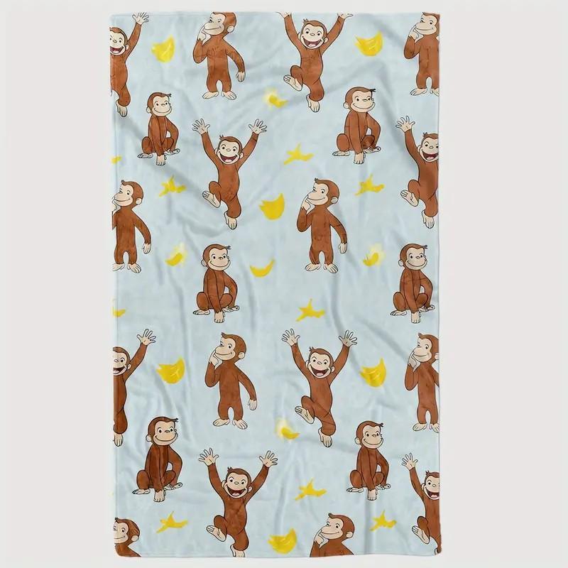 digital printed flannel Warm Throw Blanket with a Curious George monkey and banana pattern, suitable for sofas, beds, travel, camping, and office use. Made of warm, comfortable, and soft fabric, machine washable, for birthday and holiday gifts