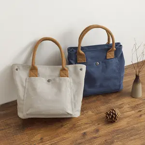 Large-capacity tote bag with a multi-pocket design, suitable for work, school, and travel. An ideal handbag for professionals, teachers, nurses, college students, and moms. Made from durable canvas, it’s a fashionable and practical women’s bag.