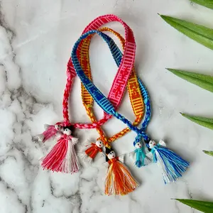 Comunidad Handwoven Bracelet with Dolls