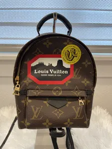 Pre-owned Louis Vuitton canvas Backpacks Monogram Mini Palm Springs Limited Edition World Tour Stylish Design with Classic Monogram Pattern