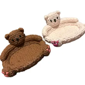 Knitted bear coasters