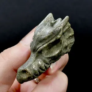 ONE 2in Pyrite Carved Crystal Dragon Skull