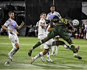 Larrys Mabiala Portland Timbers Unsigned MLS is Back Final Header Goal Photograph