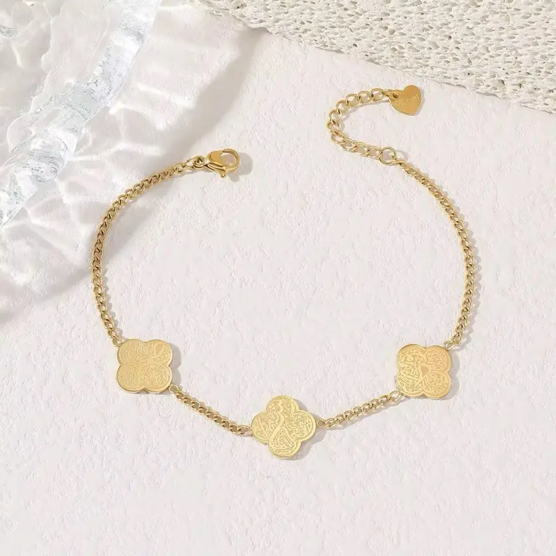 Waterproof Gold Clover Bracelet - Elegant Design with Four Clover Charms and Secure Clasp Closure