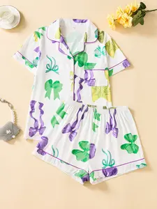 Two-piece bow-patterned ladies' pajama set - short-sleeved button-down top with shorts - all-season comfortable style