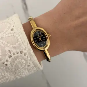 Women's Vintage Bracelet Watch, Retro Minimalist Gold-Tone Stainless Steel Timepiece with Simple Oval Analog Quartz Face
