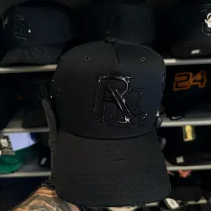 Rude Awakenings Tombochio Total Black GAD Cap with Embroidered Logo and Adjustable Strap