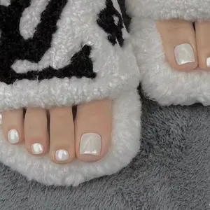 Shimmer Wink Toes Press On Toenails | CurvLife Nail | 24pcs Medium Square Fake Toenails | Glossy Finish with Clean White Hue & Delicate Shimmer | Easy to Apply, Comfortable & Long-Lasting | Great for Lounging, Cozy Days, Summer Looks & Everyday Wear