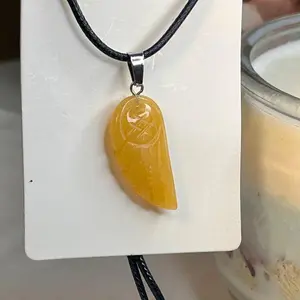 Orange Calcite Angel Wing Necklace