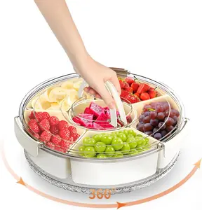1 piece of a rotating snack tray with lid, ideal for storing candies, fruits, nuts, and dried fruits. This round compartmentalized platter is perfect for use in the living room, at parties, or during weddings.