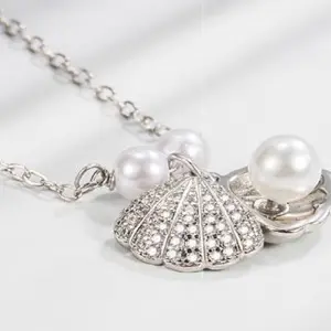 Peek a boo pearl Necklace .925 sterling silver