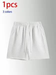 Men’s summer waffle jacquard casual shorts — loose straight fit, cool breathable feel, mid-length; versatile elastic waistband with drawstring; solid color textured streetwear pants; multiple colors available