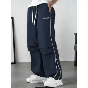 Men’s drawstring waist track pants with side stripes — loose fit casual sweatpants available in multiple colors for daily wear, street style menswear, gym, sporty, stylish activewear, athletic dark blue sportswear pants, men’s sweatpants, FallFreshness