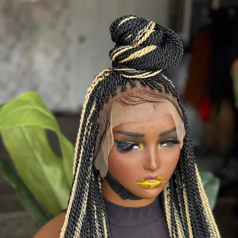 Full lace Senegalese twist color 1b with blond highlights 28/30 inches ready to ship!This wig is a full lace very beautiful