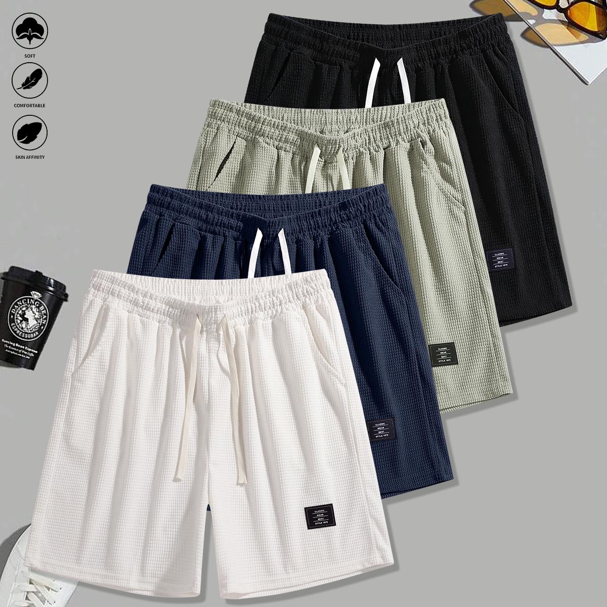 Set of 4 men’s summer new loose casual athletic shorts featuring an elastic waistband with drawstring adjustment, side pockets for convenient storage, knit fabric—ideal for running, workouts, outdoor activities, and everyday wear.